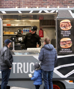 bbq food truck serves its customers